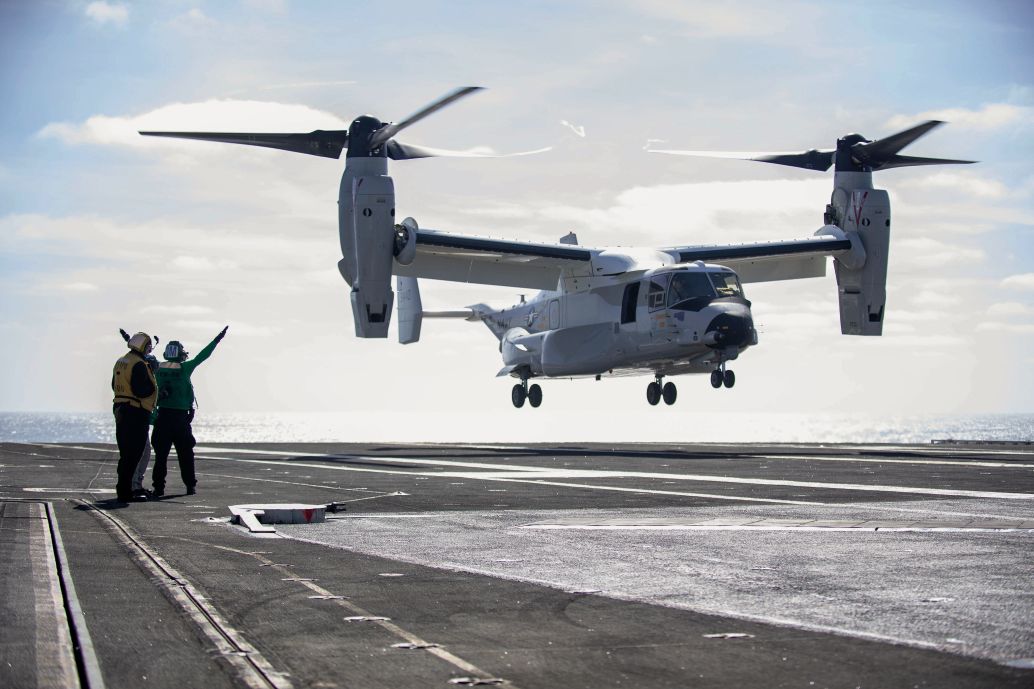 A CMV-22B from VRM-30 lands on a carrier