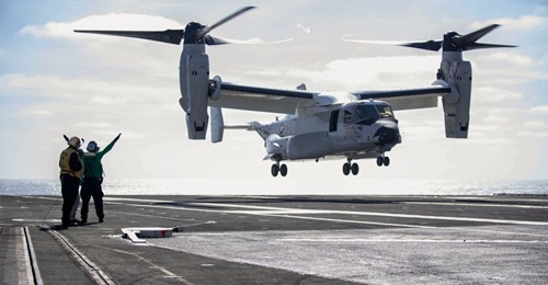 A CMV-22B from VRM 30 comes into land on USS 
        
         (CVN 70) for the first time on 20 November.