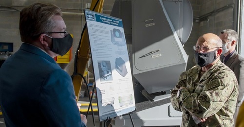 Chief of Naval Operations Admiral Michael Gilday was briefed on the ODIN - HELCAP technology transition during a 17 November visit to the Naval Surface Warfare Center Dahlgren Division. An ODIN system is visible in the background.
