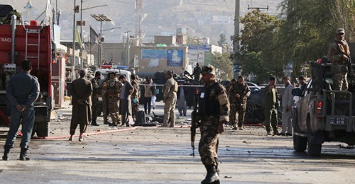 Afghan security forces inspect the scene of a car bomb explosion in Kabul on 27 October that resulted in at least three people being killed and 13 others wounded. US lawmakers have included provisions in the final version of the fiscal year 2021 defens...