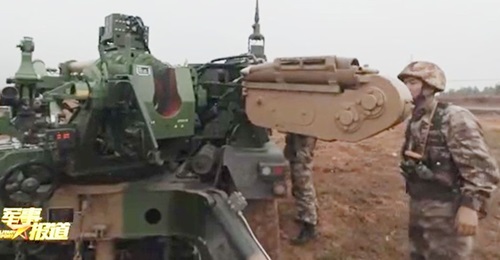 A screengrab from CCTV footage released on 8 December showing the semi-automatic loading system of the new 122 mm CTL181A-based SPH, which is being used by a light synthetic brigade within the PLAGF's 72nd Group Army.