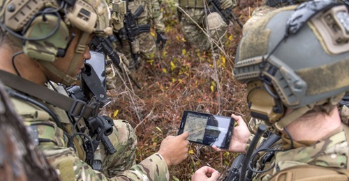 Members of the US Air Force 6th Special Operations Squadron operate an Android-like end user device during training exercises.
