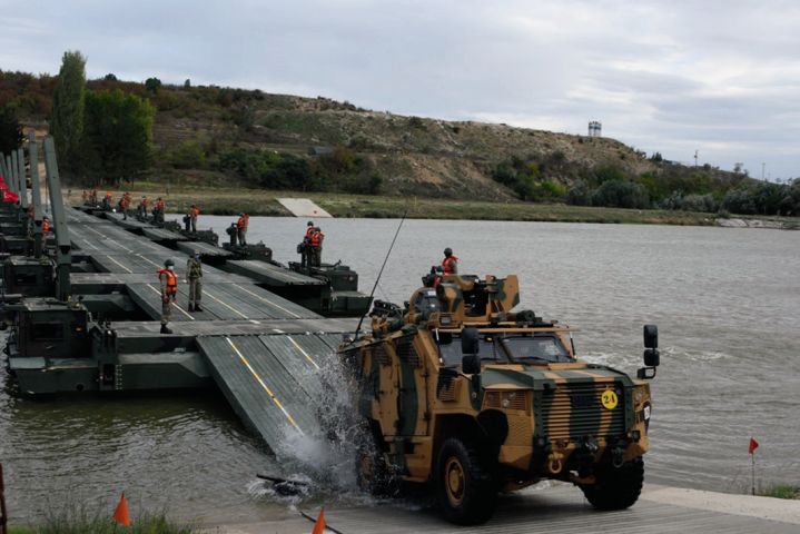 Turkey’s 66th Mechanised Infantry Brigade was certified to lead the NRF VJTF in 2021 during exercise ‘Anatolian Caracal 2020’ in October (photo of Vuran armoured vehicle leaving pontoon bridge). (NATO’s Allied Land Command)
