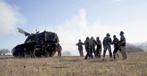 The German Army is training Hungarian artillerymen on the PzH 2000, pictured firing the SPH.
