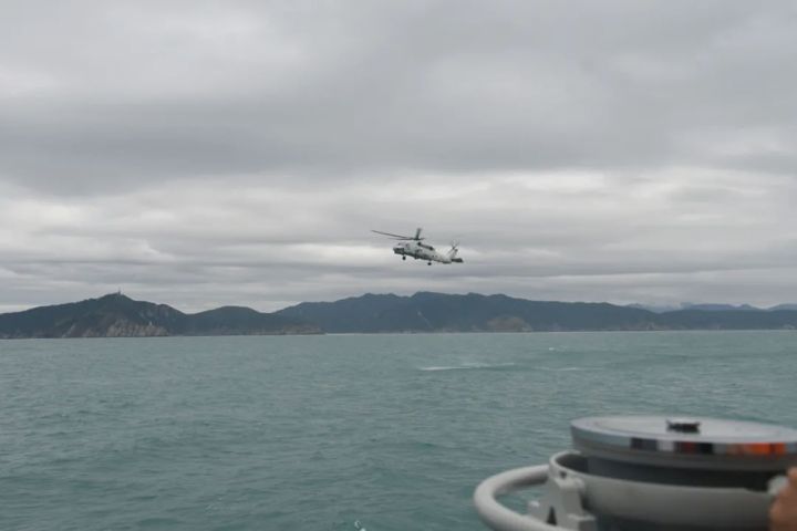 An image published by the PLAN’s SSF in early January showing new ASW-capable variant of the Z-20 helicopter taking part in what appear to be naval exercises at an undisclosed location. (PLA Navy’s South Sea Fleet )