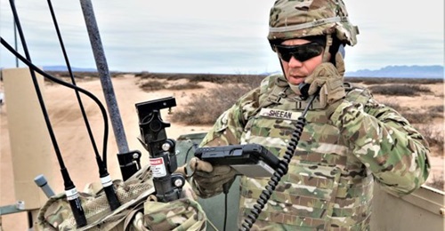 A US Army soldier conducts tests on prototype RF networked communication systems at Fort Bliss, Texas.