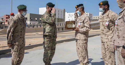 General Brigadier General Keith Phillips, US defense attaché in Abu Dhabi, exchanges gifts with Brigadier General Sultan al-Niyadi during a joint exercise with US marines and the UAE Presidential Guard at the Al-Hamra Combat Training Centre on 16 ...