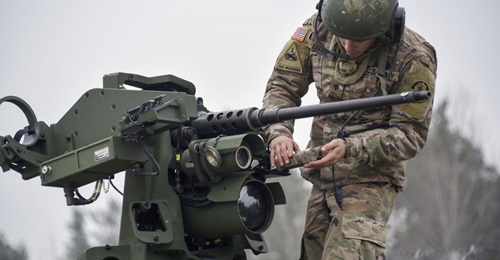 A US soldier assigned to 2nd Cavalry Regiment prepares for a boresight alignment on a CROWS mounted on a Stryker Infantry Carrier Vehicle, in Germany in 2018. The army's CROWS-J Engineering Change Proposal has been delayed due to software problems and ...