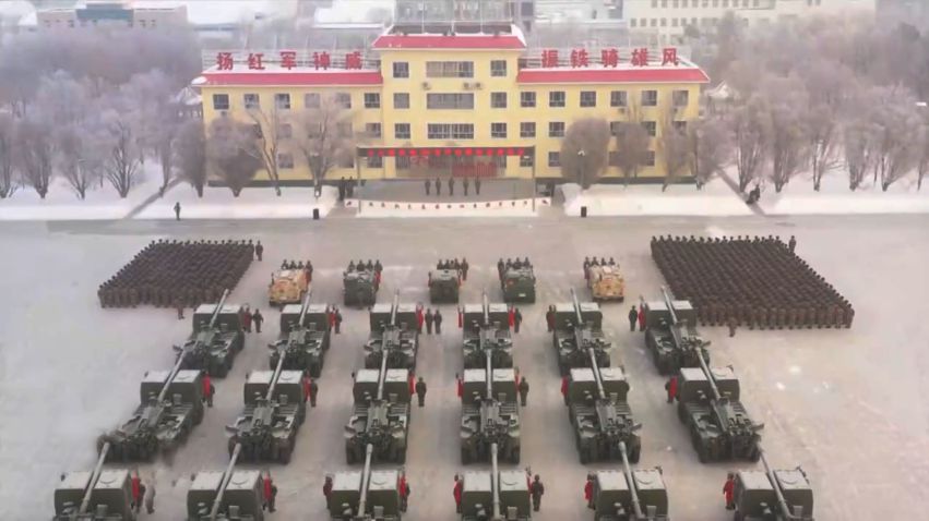 A screenshot from CCTV footage showing a commissioning ceremony for at least 18 Norinco PCL-181 SPHs. The systems entered service with a PLAGF artillery brigade near Tianshan in Xinjiang. (CCTV)