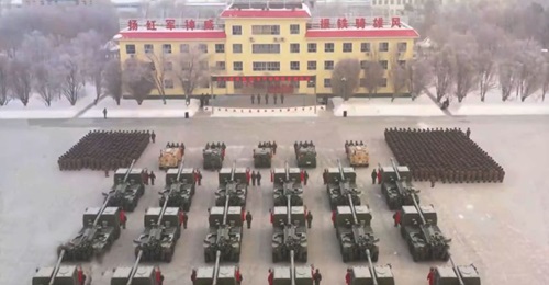 A screenshot from CCTV footage showing a commissioning ceremony for at least 18 Norinco PCL-181 SPHs. The systems entered service with a PLAGF artillery brigade near Tianshan in Xinjiang.