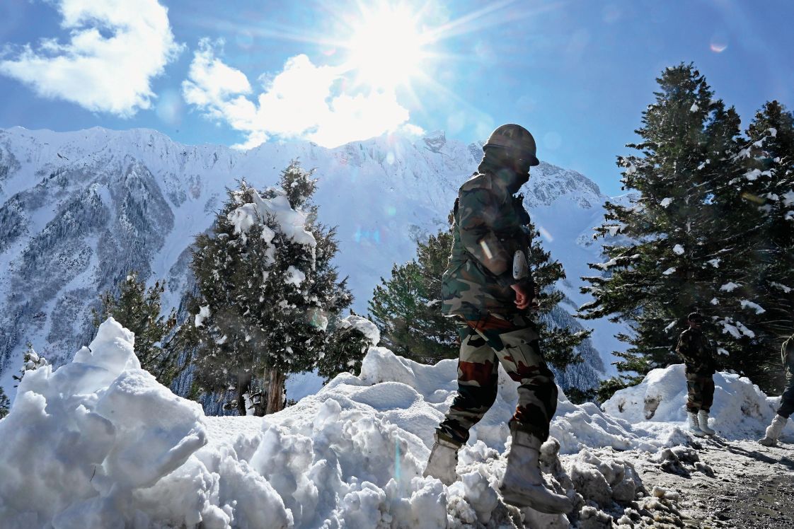 Indian soldiers near the Zojila mountain pass connecting Srinagar to Ladakh, bordering China, in November 2020. The Indian and Chinese armies have agreed to pull back along the northern and southern banks of the 4,350 m-high Pangong Tso (Pangong Lake) in the Himalayan Ladakh region. (Tauseef Mustafa/AFP via Getty Images)