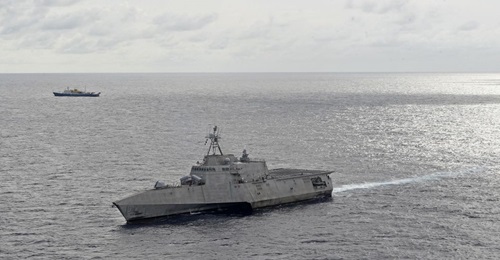US Navy Independence-class littoral combat ship USS 
        
         conducts routine operations in the vicinity of the Chinese research vessel 
        
         in July 2020 as part of a rotational deployment in the US 7th Fleet's area of ...