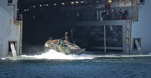An ACV heads into the water. BAE Systems recently delivered the first ACV command and control variant to the USMC.