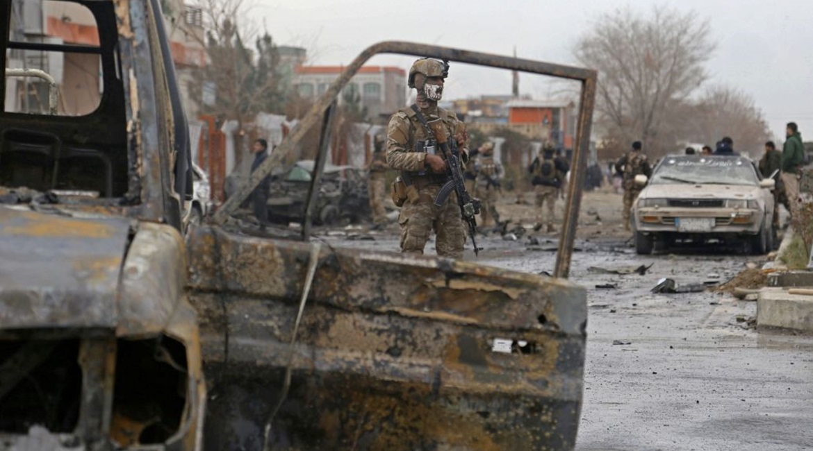 An Afghan soldier stands guard at the site of an attack in Kabul in December 2020. The number of civilian casualties in the fourth quarter of last year increased by 45% compared to the same period in 2019, according to a 23 FebruaryUN report.