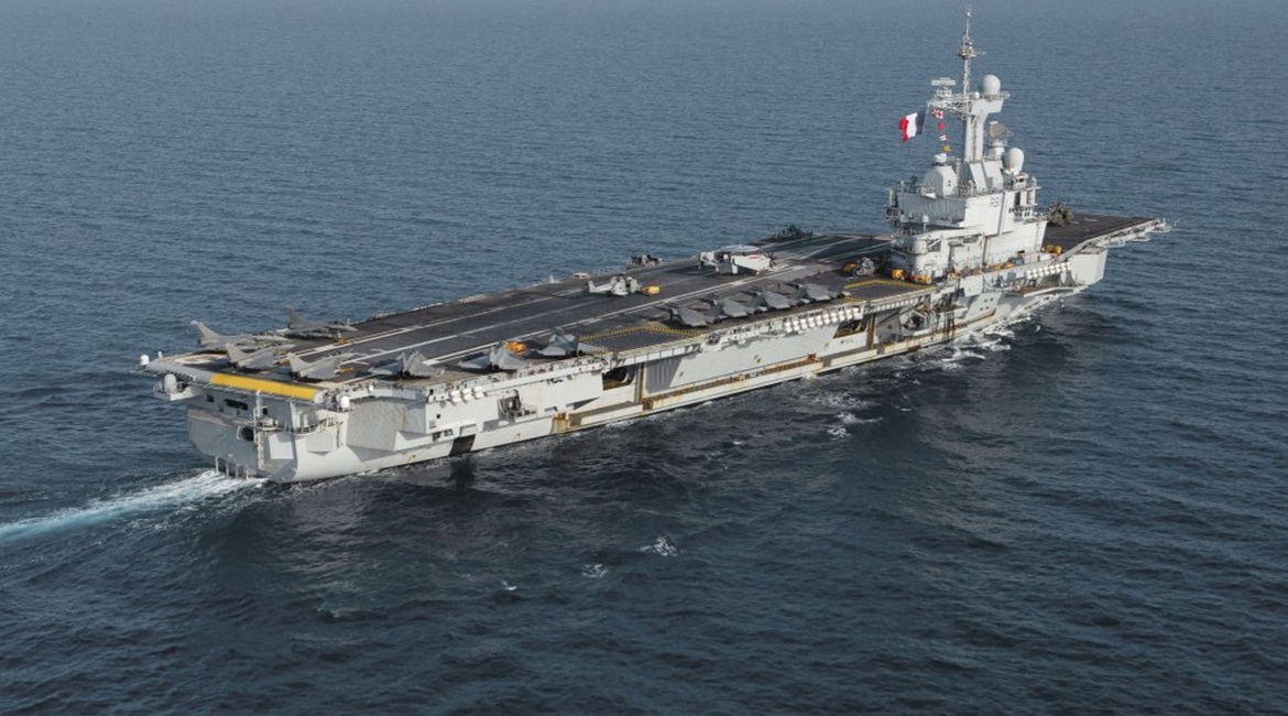 The French Navy's carrier strike group led by the aircraft carrier FS Charles de Gaulle (pictured) will join 'Dynamic Manta' as it transits the exercise area during a pre-deployment work up.