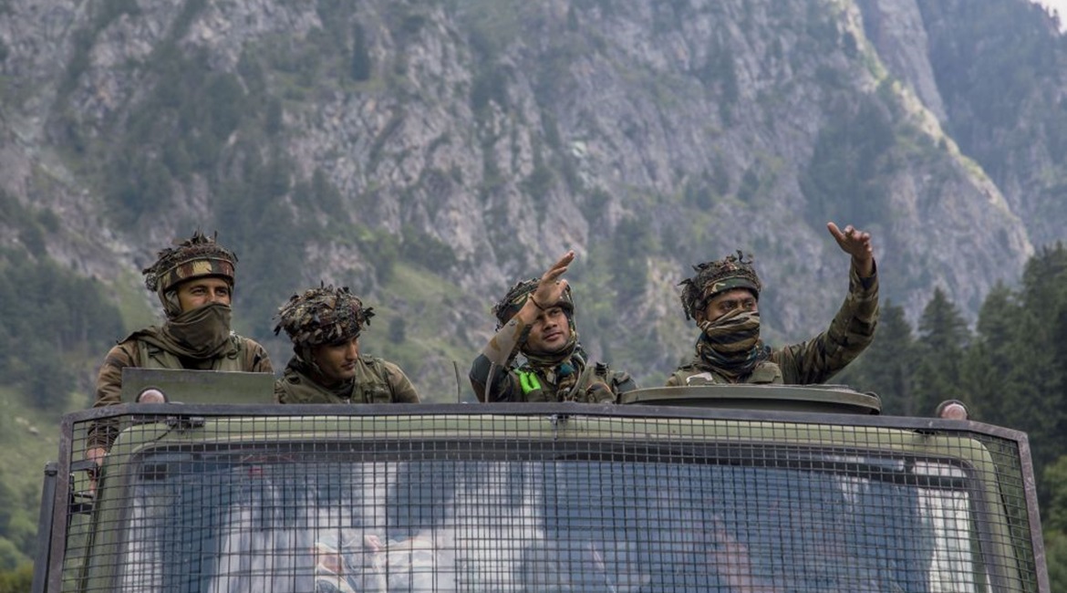 An Indian army convoy carries reinforcements and supplies towards Leh, on a highway bordering China, on 2 September 2020 in Gagangir, India, following renewed clashes between China and India over their shared border. Although China is committed not to ...