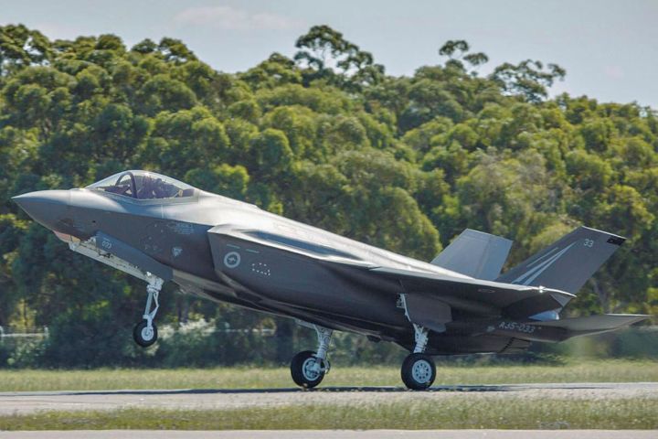 An Australian F-35A fighter (with serial number A35-033) is seen here touching down at RAAF Base Williamtown in February after transiting from the United States. (Commonwealth of Australia/Department of Defence)