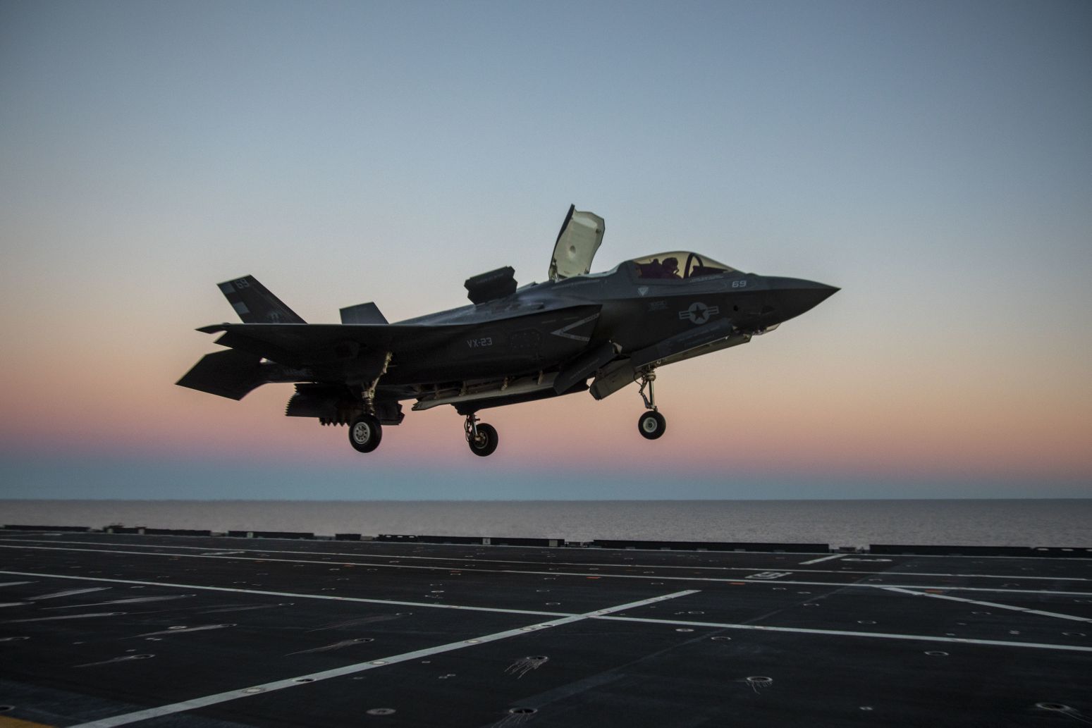 
        F-35 test pilot Major Brad Leeman performs a vertical landing with an F-35B aboard Italian aircraft carrier ITS 
        Cavour
         (CVH 550) on 3 March 2021. The Pentagon and Lockheed Martin reached a settlement over costs incurred by the Department of Defense to bring non-ready-for-issue, or installation, spare parts to ready-for-issue condition.
       (US Navy)