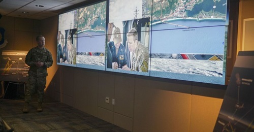 A USAF officer briefs senior leaders on the first ABMS demonstration in December 2019 at Eglin Air Force Base, Florida.