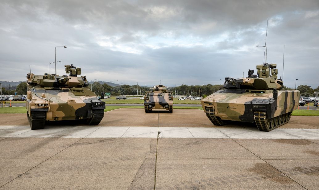 The Australian DoD displayed for the first time on 12 March the two contenders for the Australian Army’s IFV requirement under Project Land 400 Phase 3. Rheinmetall’s Lynx KF41 (right) and Hanwha Defense's Redback (left) are competing to replace the army’s obsolescent M113AS4 APCs (background). (Australian DoD via Twitter )