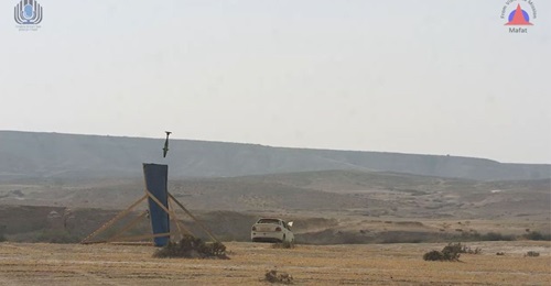 A still from a video shows an Iron Sting mortar round accurately hitting a target during trials.