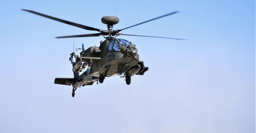 The AH-64E Apache testbed used for the demonstration can be seen with a pair of Spike NLOS missiles on its right-side outer weapons pylon.