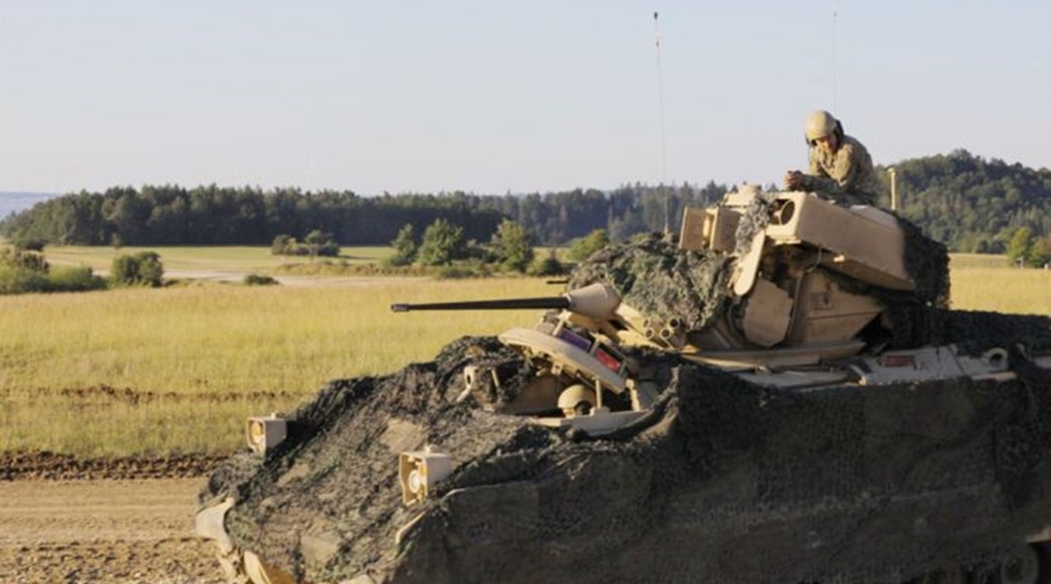 A US soldier awaits orders for movement during a combined arms live-fire exercise at Grafenwoehr Training Area, Germany in September 2020.