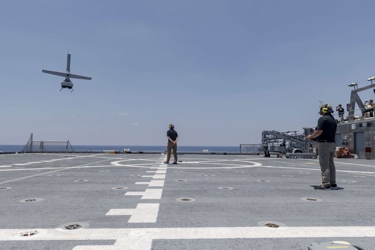
        A Martin UAV V-Bat VTOL unmanned aircraft prepares to land on the flight deck of the Military Sealift Command’s Spearhead-class catamaran expeditionary fast transport vessel USNS 
        Spearhead
         (T-EPF 1) on 24 July 2019. The V-Bat’s ability to autonomously turn into the wind in a hover is one reason why a Martin UAV executive believes the aircraft has found success with maritime military opportunities.
       (US Navy)