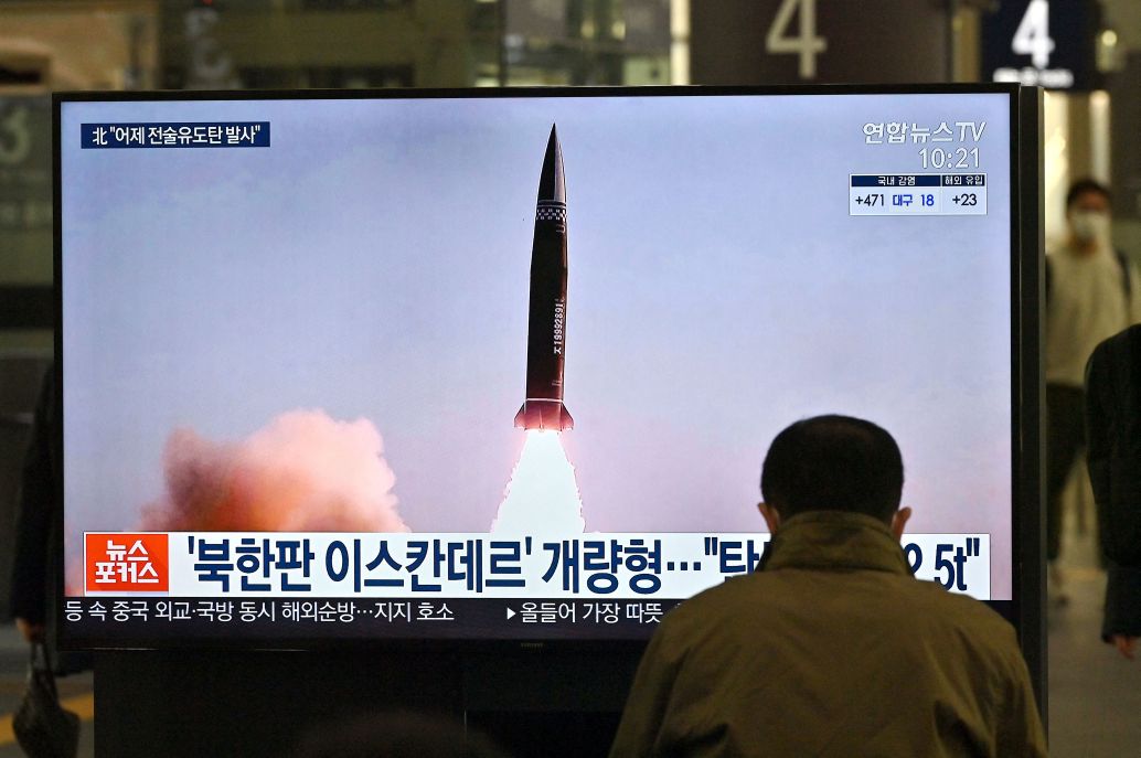 News footage of North Korea’s latest SRBM test launch shown on a TV screen at Suseo railway station in Seoul on 26 March. Pyongyang appears to have test-fired the previous day an SRBM type that it first showcased on 14 January. (Jung Yeon-je/AFP via Getty Images)