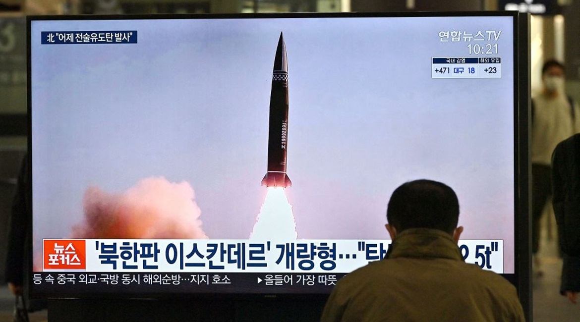 News footage of North Korea's latest SRBM test launch shown on a TV screen at Suseo railway station in Seoul on 26 March. Pyongyang appears to have test-fired the previous day an SRBM type that it first showcased on 14 January.