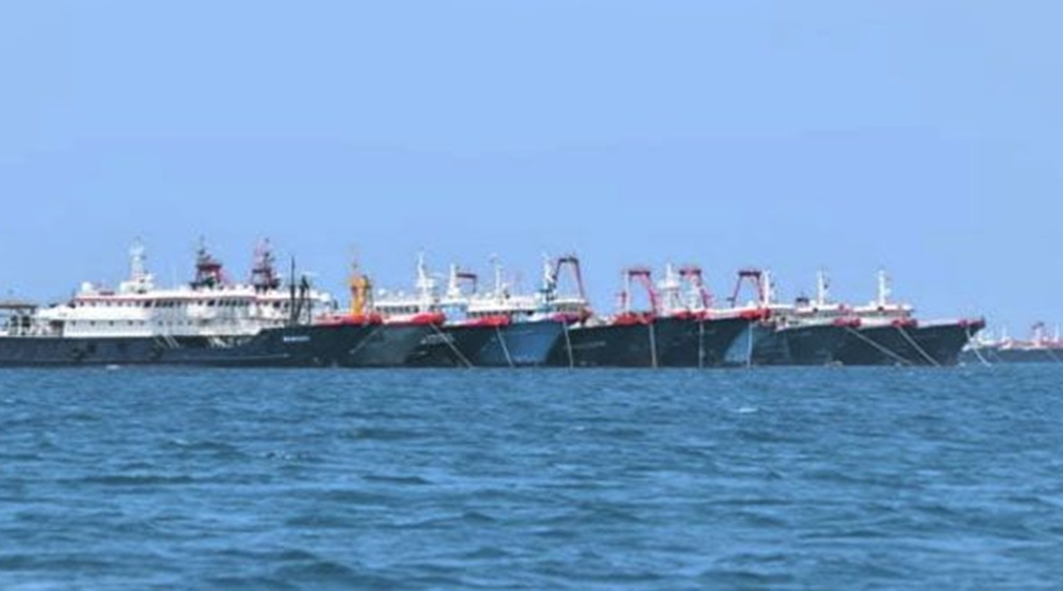 An image captured on 7 March showing some of the Chinese fishing vessels moored near the disputed Whitsun Reef in the Spratly island chain.