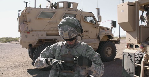 A US soldier operates an Android-based network end-user device during an army network evaluation exercise at White Sands Missile Range, New Mexico.