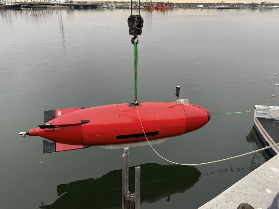 DIVE-LD AUV being lowered into the water for a trial. (Dive Technologies)