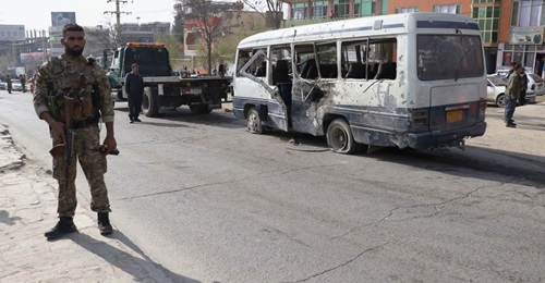 Afghan security officials inspect the scene of a roadside bomb attack that took place on 18 March in Kabul and targeted Afghan government employees. UNAMA said in a 14 April report that the number of civilian casualties in Afghanistan rose by 29% in th...