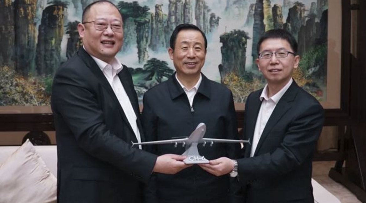 A model of the in-development CH-6 armed reconnaissance UAV being presented to Hunan Provincial Committee secretary and Hunan Provincial People's Congress Standing Committee director Xu Dazhe by CAAA president Hu Meixiao and secretary Wang Xianyu on 16...