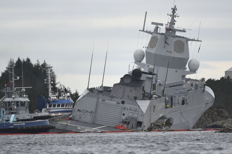 
        The Norwegian frigate HNoMS 
        Helge Ingstad
         takes on water after colliding with the tanker 
        Sola TS
         on 8 November 2018 in the Hjeltefjord near Bergen.
       (MARIT HOMMEDAL/AFP via Getty Images)
