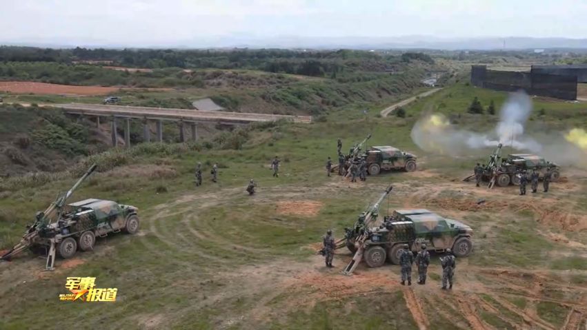 A screengrab from footage released by CCTV on 23 April showing several examples of the PLAGF’s new 122 mm 6×6 SPH during a recent live-fire exercise. (CCTV)
