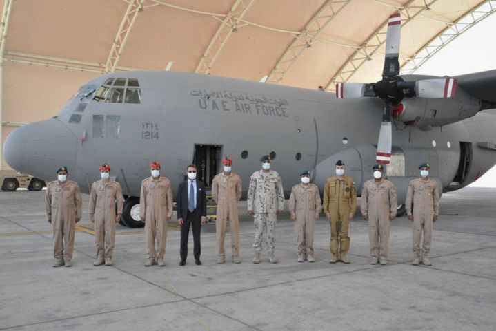French ambassador Xavier Chatel and Emirati personnel stand next to the C-130 before it departs for its mission in the Sahel. (WAM)