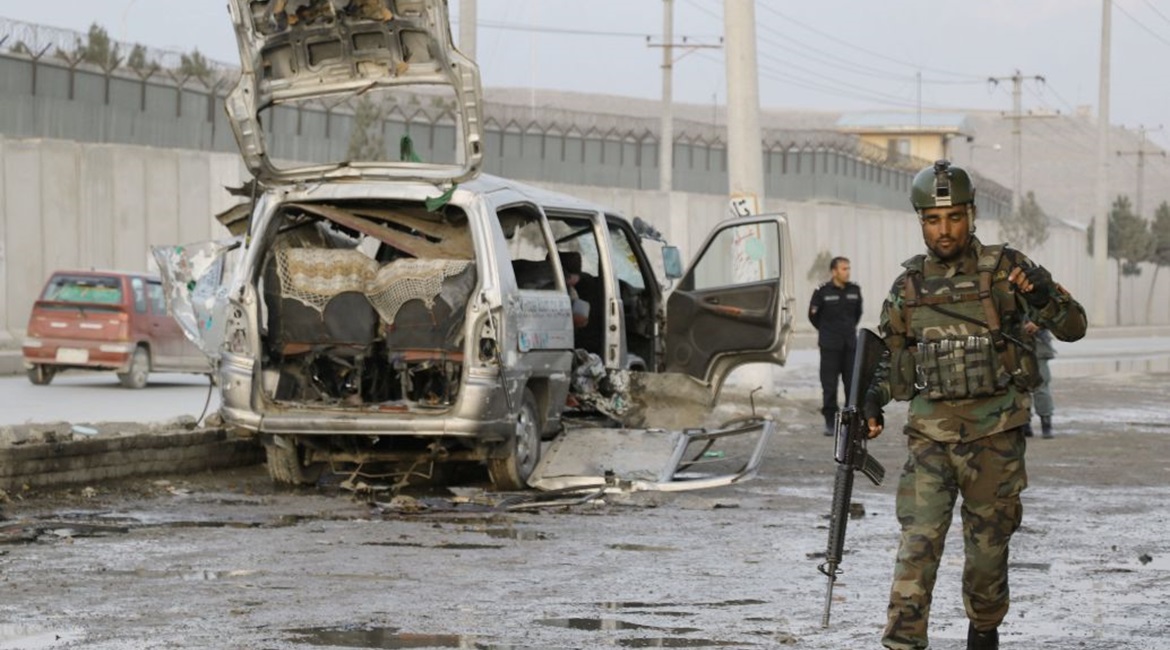 Afghan security officials inspect the scene of bomb blast in Kabul on 7 March that killed and wounded several civilians. The high levels of violence during the first quarter of this year have resulted in a considerable increase in the number of civilia...