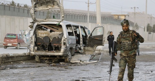 Afghan security officials inspect the scene of bomb blast in Kabul on 7 March that killed and wounded several civilians. The high levels of violence during the first quarter of this year have resulted in a considerable increase in the number of civilia...