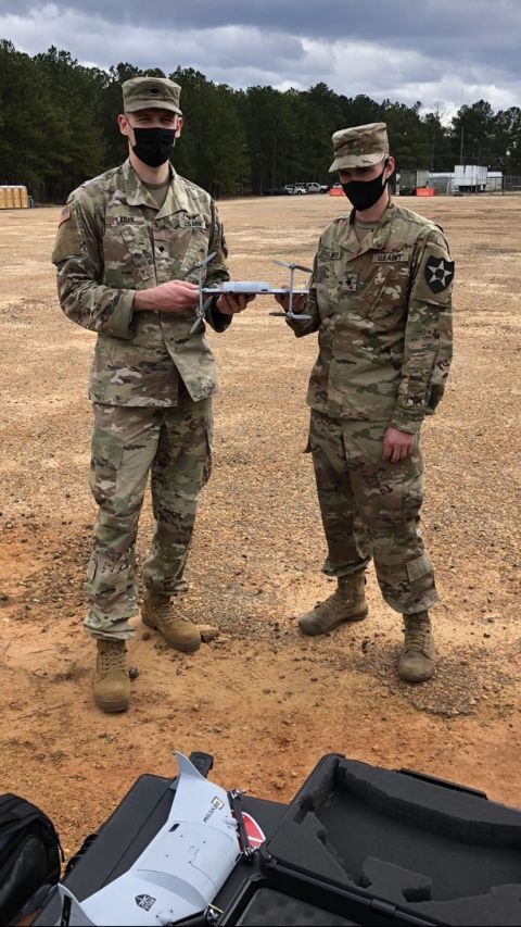 US soldiers hold a flight-ready Bell micro UAS with propellers. The US Army's corporate research laboratory wants to continue its collaborative relationship with Bell for the development of the aircraft.