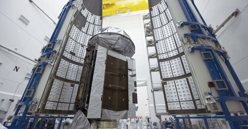 The MUOS 4 communication satellite being prepared for deployment.