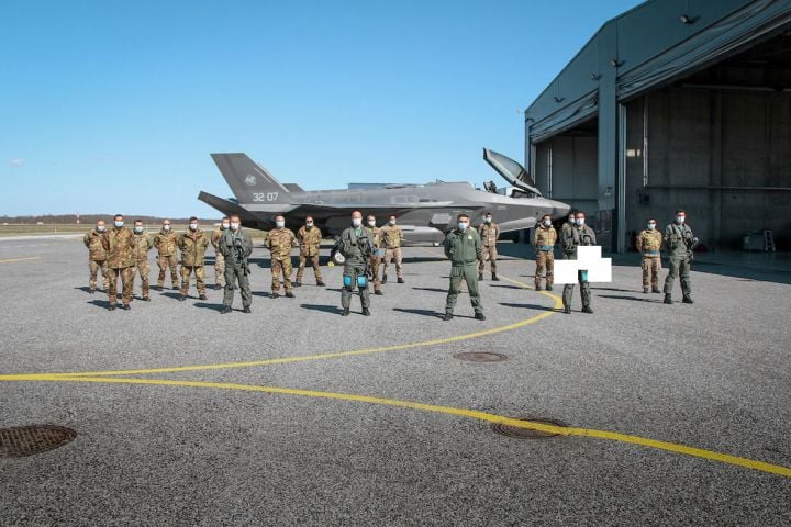 One of the four Italian Air Force F-35As that recently arrived at Amari Air Base in Estonia, alongside some of the service personnel that will conduct the type’s first operation in support of the NATO Baltic Air Policing mission. (Bundeswehr via NATO Allied Air Command)