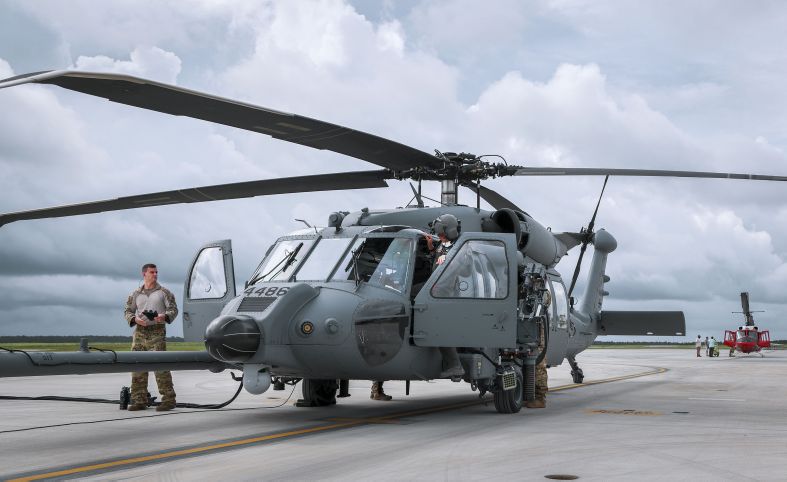 Members of a HH-60W aircrew prepare for a 27 July 2020 flight at Eglin Air Force Base in Florida. Sierra Nevada is protesting the US Air Force’s intent to sole-source a contract to HH-60W developer Sikorsky for aircraft upgrades. (US Air Force)