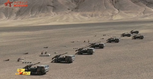 A screengrab from CCTV footage released on 10 May showing that the PLAGF's Xinjiang Military Command has been equipped with the new 122 mm, 4×4 SPH rumoured to have the designation PCL-161.