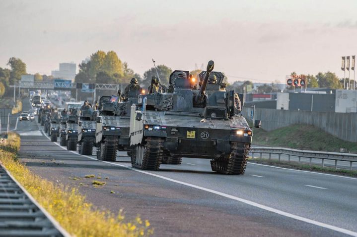 The Dutch Ministry of Defence has worked with civil authorities to create three multimodal corridors of infrastructure for military movements across the Netherlands: road (photo of CV90 infantry fighting vehicles moving by highway), rail, and inland waterways. (Dutch MoD)