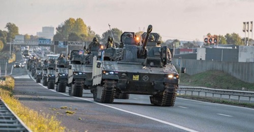 The Dutch Ministry of Defence has worked with civil authorities to create three multimodal corridors of infrastructure for military movements across the Netherlands: road (photo of CV90 infantry fighting vehicles moving by highway), rail, and inland wa...