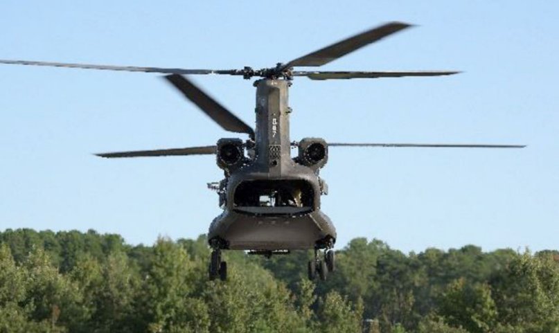 The standard Honeywell T55 engine that currently powers the Chinook puts out 5,000 shp for a combined 10,000 shp per helicopter. With the GE T408 fitted, the Chinook generates a combined 15,000 shp.  (US Army CCDC AvMC)