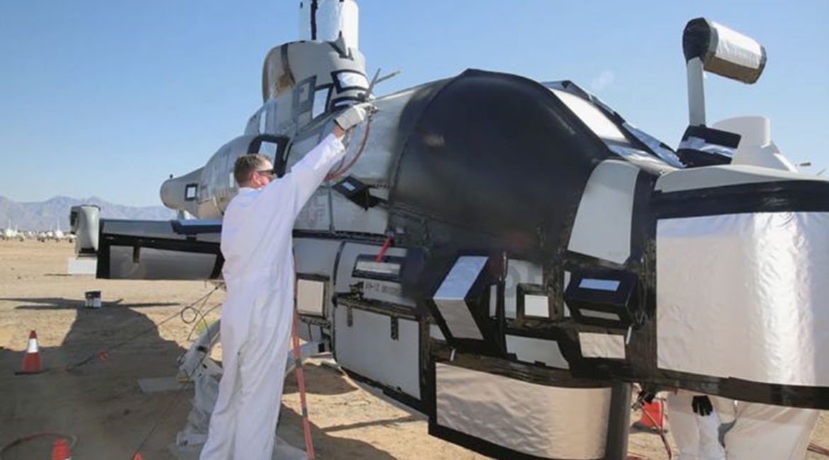 An AH-1Z recently arrived at the boneyard at Davis-Monthan AFB is prepped for long-term storage as part of the USMC's wider restricting plans.