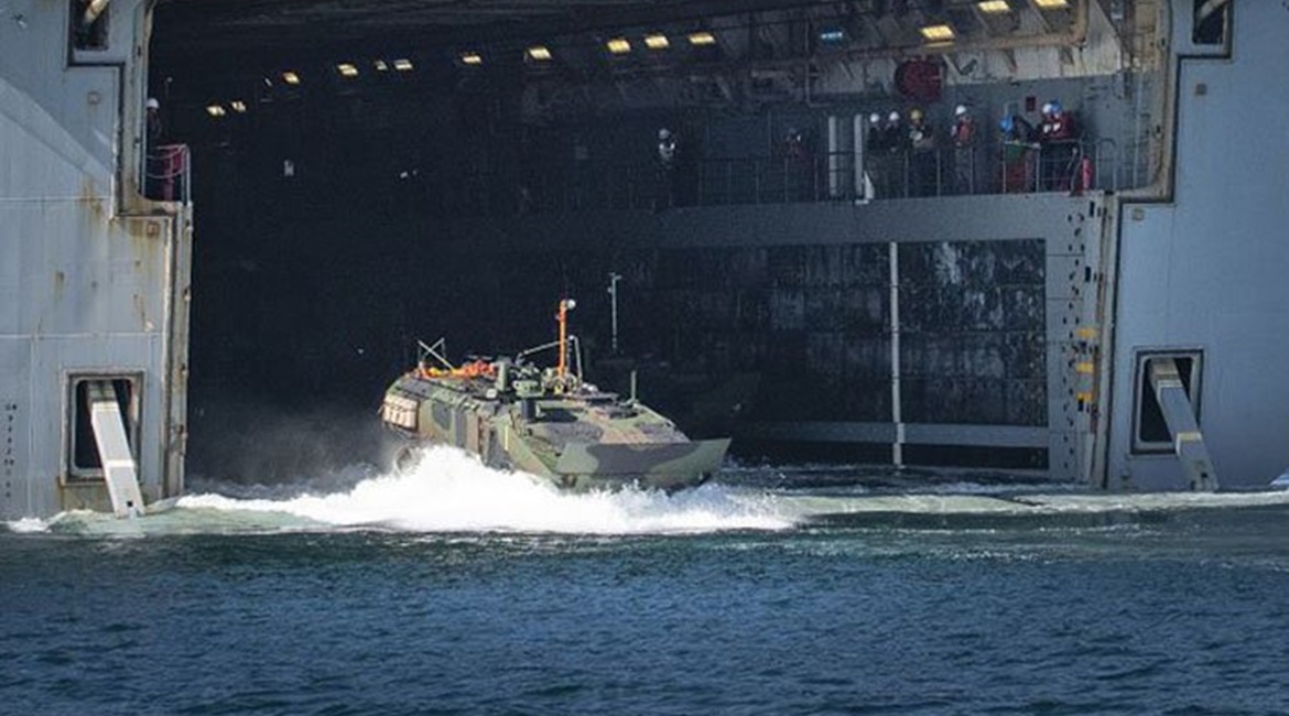 A USMC Amphibious Combat Vehicle (ACV) heads into the water. The service is divesting from legacy systems and funnelling money into newer programmes such as ACV.